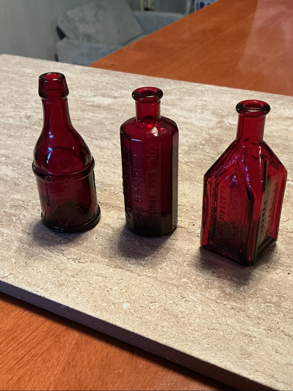 Set of 3 vintage Wheaton celebrated remedy ruby red bitters bottles.